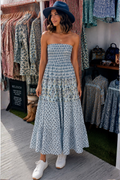 Shirred bodice blues sun dress in woodblock printed cotton voile. Can be worn as a sun dress or as a maxi skirt .