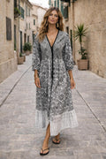Aria Black and ecru woodblock print midi dress with tie front detail. 100% cotton